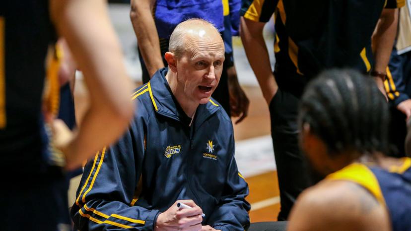 Coach Wayne Creek speaks to his players during round 20 of the N