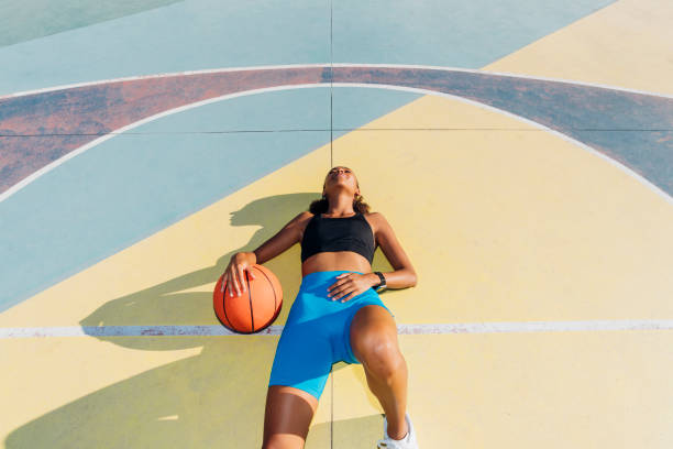 Basketball Athlete Sleeping on the Court.